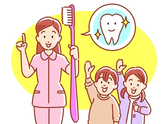 歯科助手と子どもたち